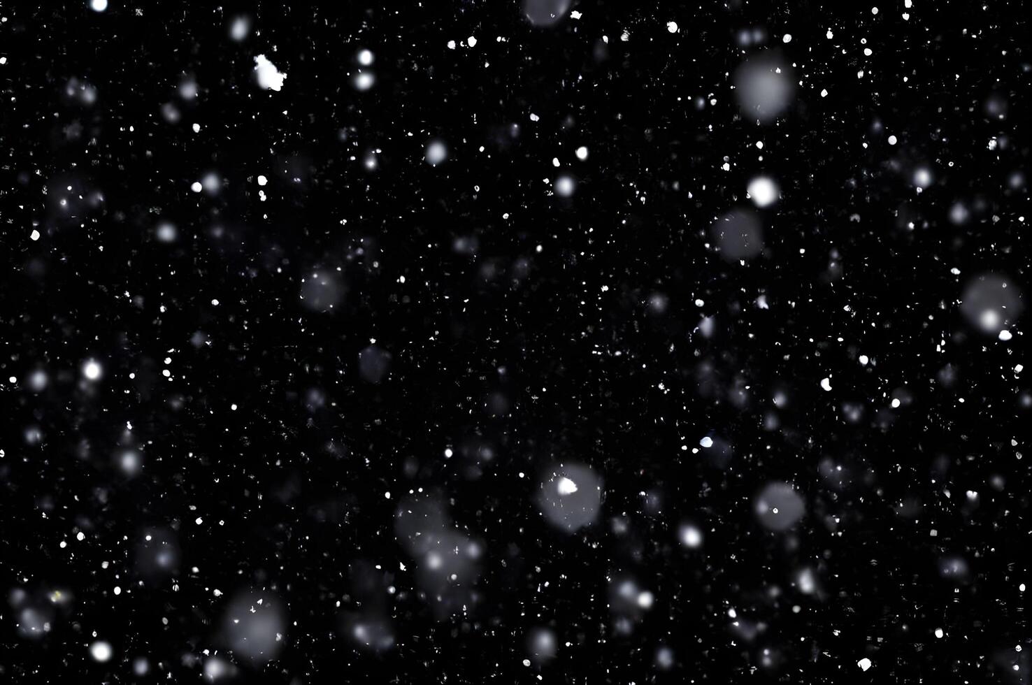 Detailed Snowfall Overlay Image Isolated on Black Background Perfect for Dynamic Visual Effects photo
