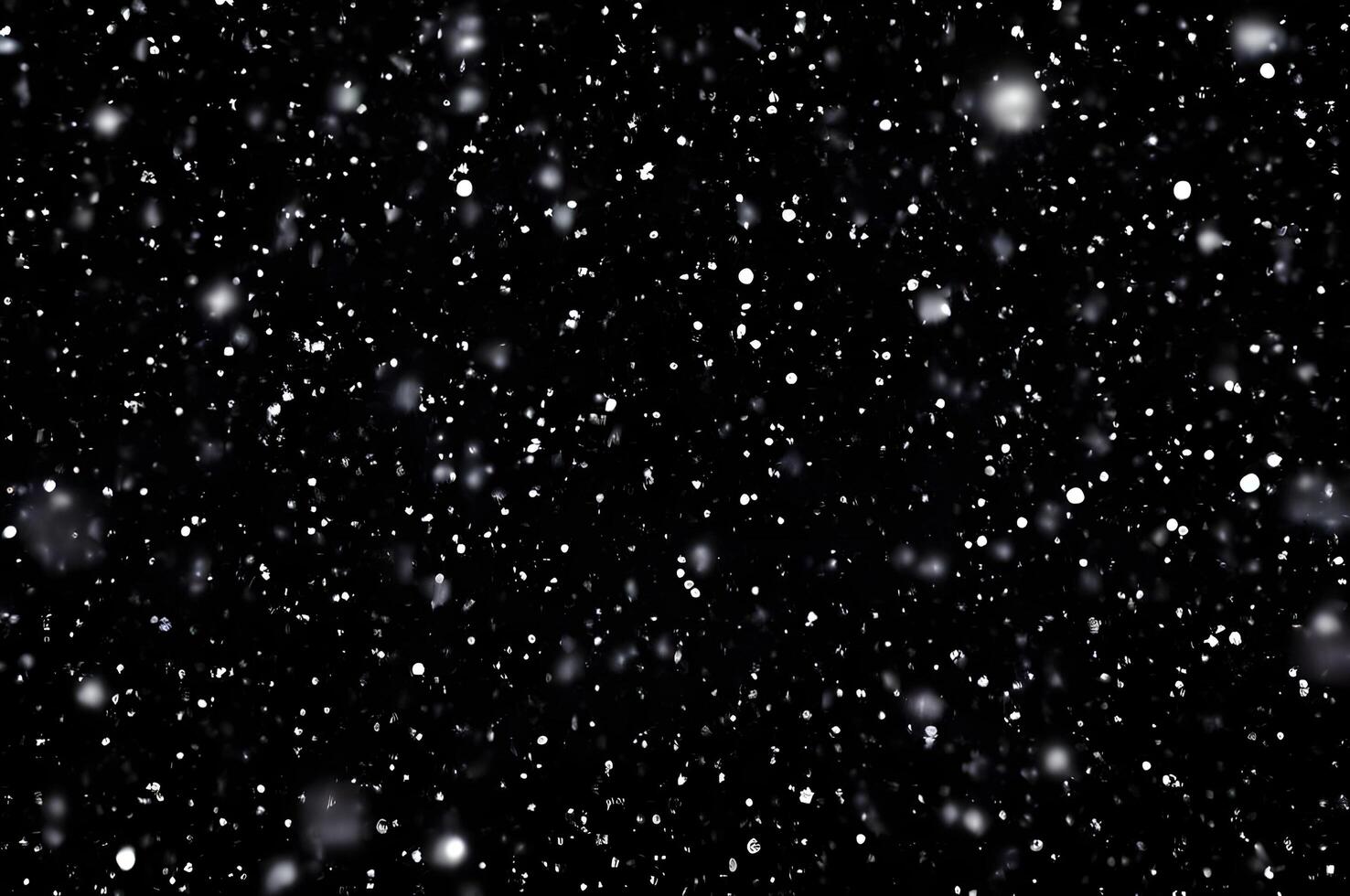 Detailed Snowfall Overlay Image Isolated on Black Background Perfect for Dynamic Visual Effects photo