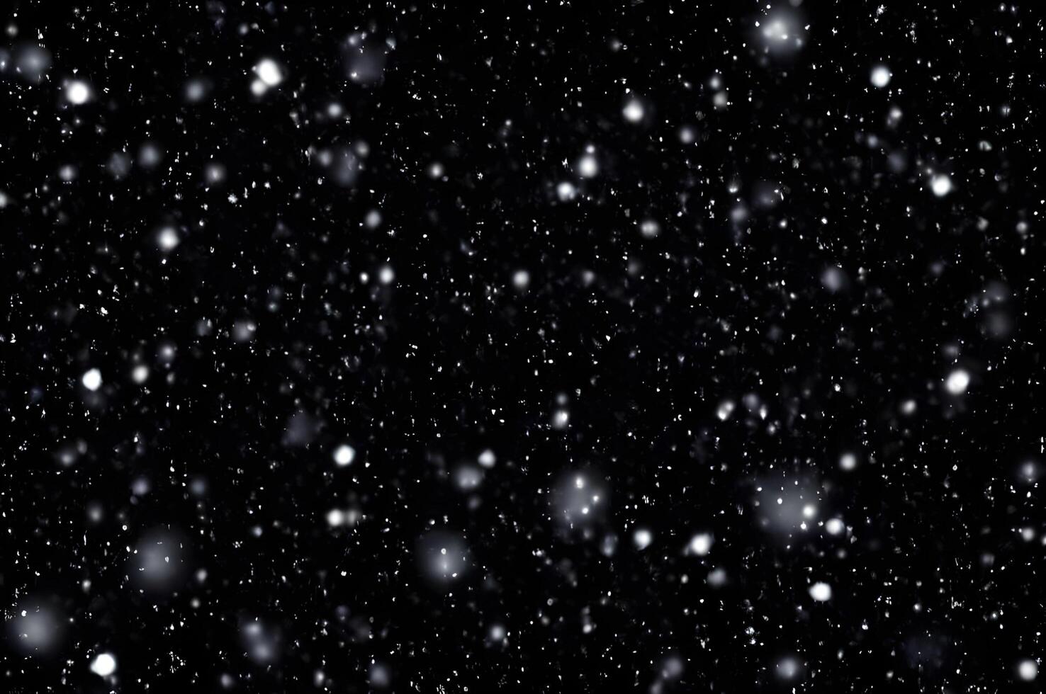 Detailed Snowfall Overlay Image Isolated on Black Background Perfect for Dynamic Visual Effects photo