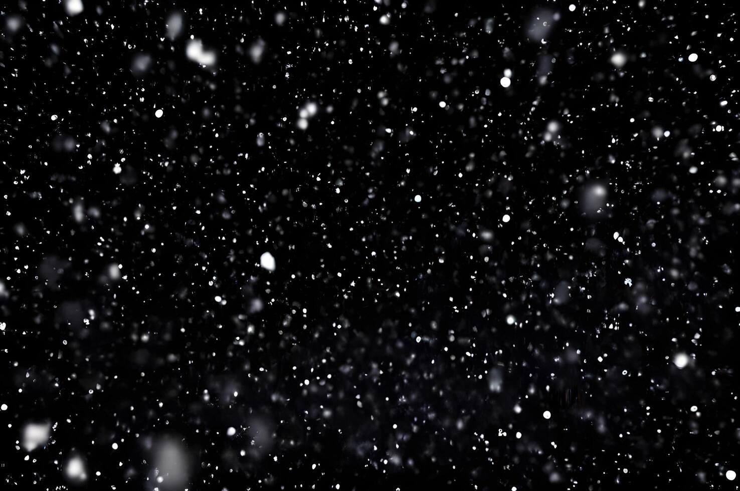 Detailed Snowfall Overlay Image Isolated on Black Background Perfect for Dynamic Visual Effects photo