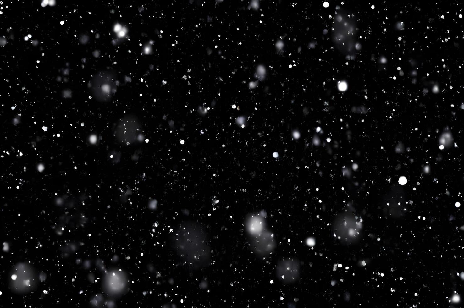 Detailed Snowfall Overlay Image Isolated on Black Background Perfect for Dynamic Visual Effects photo