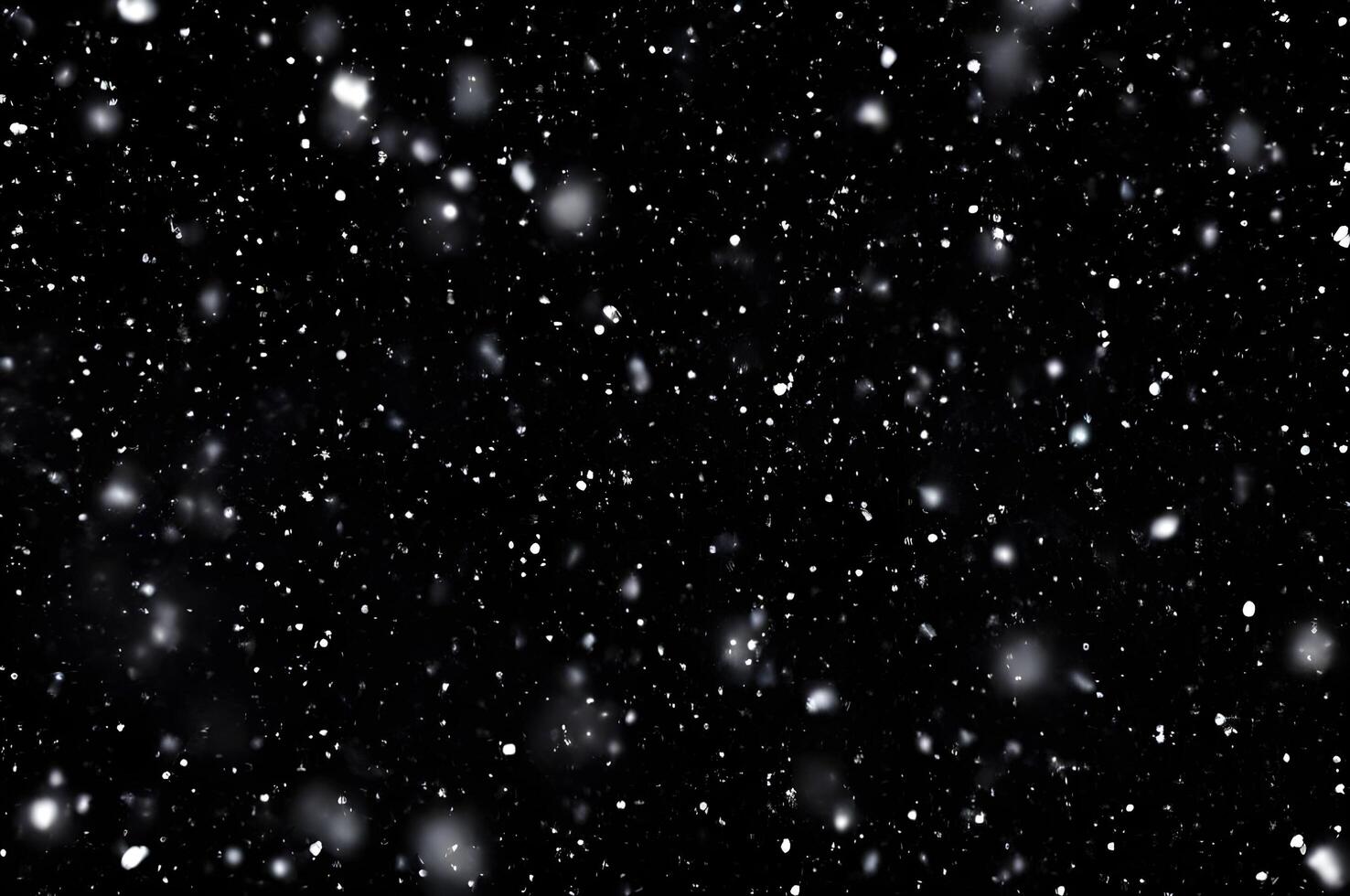 Detailed Snowfall Overlay Image Isolated on Black Background Perfect for Dynamic Visual Effects photo