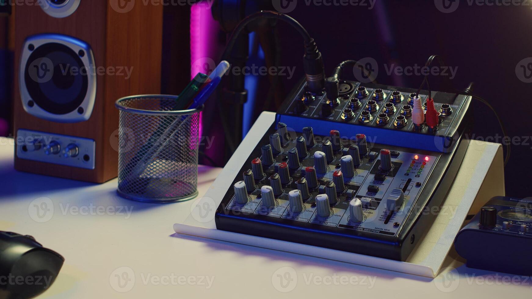 Empty home studio used for recording and mixing music with electronic modern equipment, creating soundtracks with control panel soundboard and mixer console. Signal processing. Camera A. photo