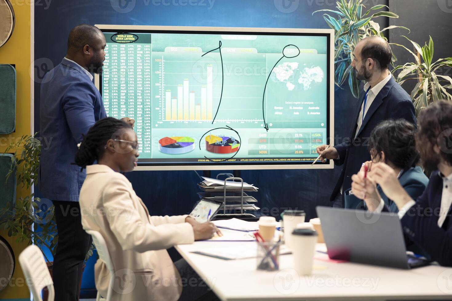 Account executive team examining trends to help make important decisions to corelate with enterprise objectives. Corporate affiliates working together to meet project deadline. photo