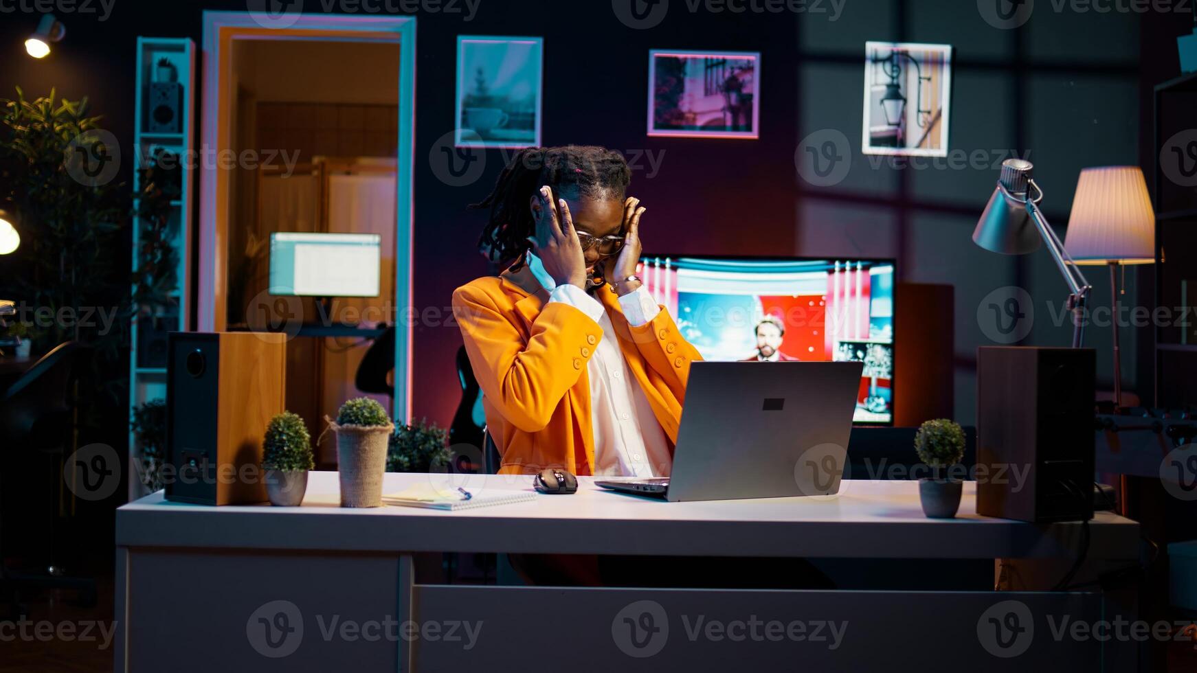 African american student communicating with professors and classmates on online class videocall, using academic web connection platforms. Girl participating in webinar college lesson. Camera B. photo