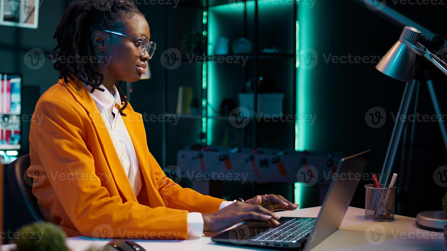 Student reviewing course materials and lecture notes before entering virtual web classroom, business administration courses. Pupil learning to interpret data using spreadsheets. Camera B. photo
