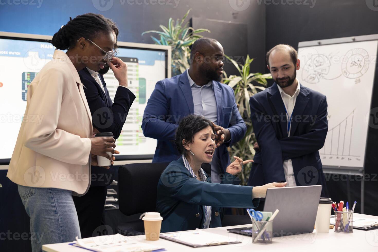 Frustrated irritated project manager feeling mad about the staff work, reviewing their progress and accomplishments. Stressed angry supervisor being disappointed with the enterprise workflow. photo