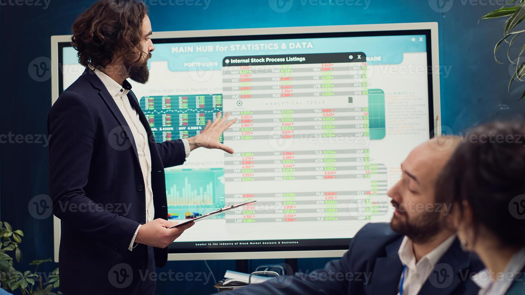 Startup team deliberates on strategic plans and financial projections during executive meeting, manager gives clipboards with infographics. Deciding resource allocation with data reports. Camera A. photo