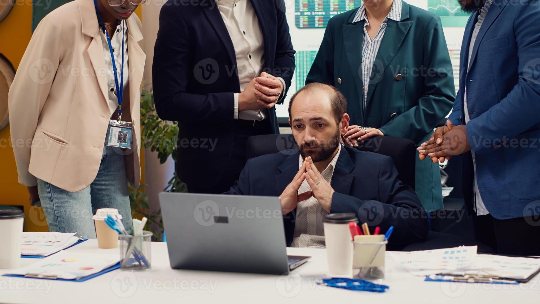Irritated difficult boss getting angry at her employees team after not finishing the project before the deadline. Crazy manager yelling at her staff members and throwing papers. Camera A. photo