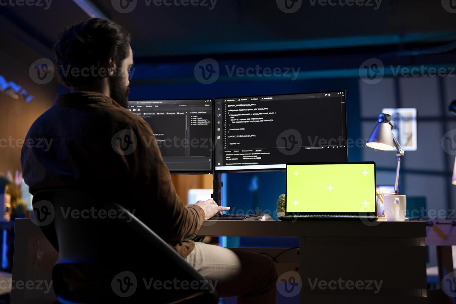 Developer working from home in apartment on green screen laptop, futureproofing company network from downtimes . Admin using chroma key notebook, increasing data security, close up photo