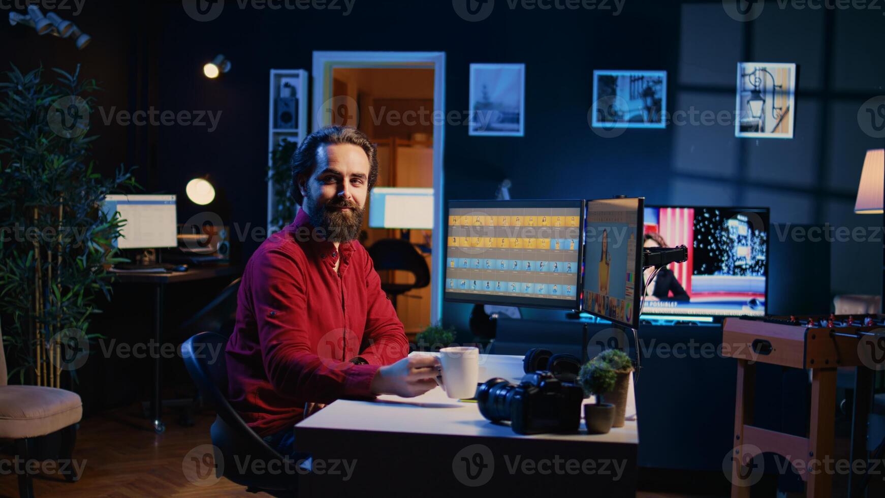 Portrait of smiling content specialist working in graphic design company, selecting best editorial pictures for social media. Happy expert editing photos in advertising agency office, dolly out shot