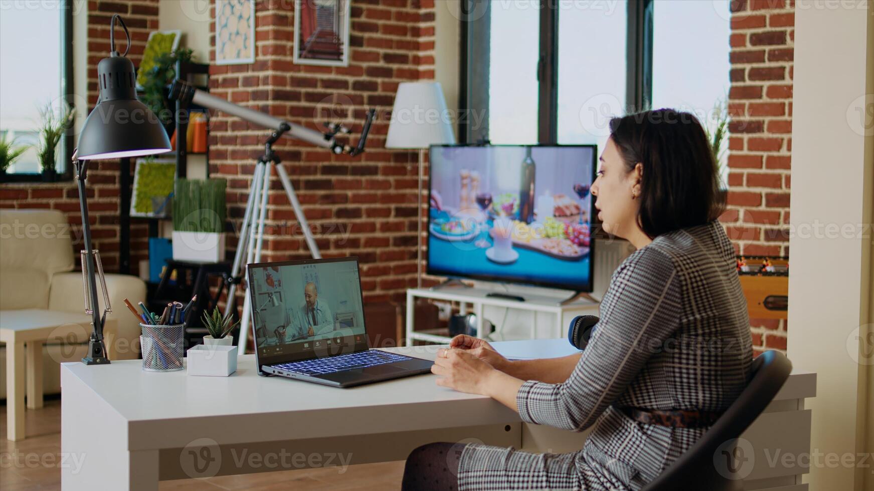 Remotely working employee in telemedicine call asking for medical advice, feeling sick. Teleworker in online consultation checkup with doctor, receiving prescription plan, camera A photo