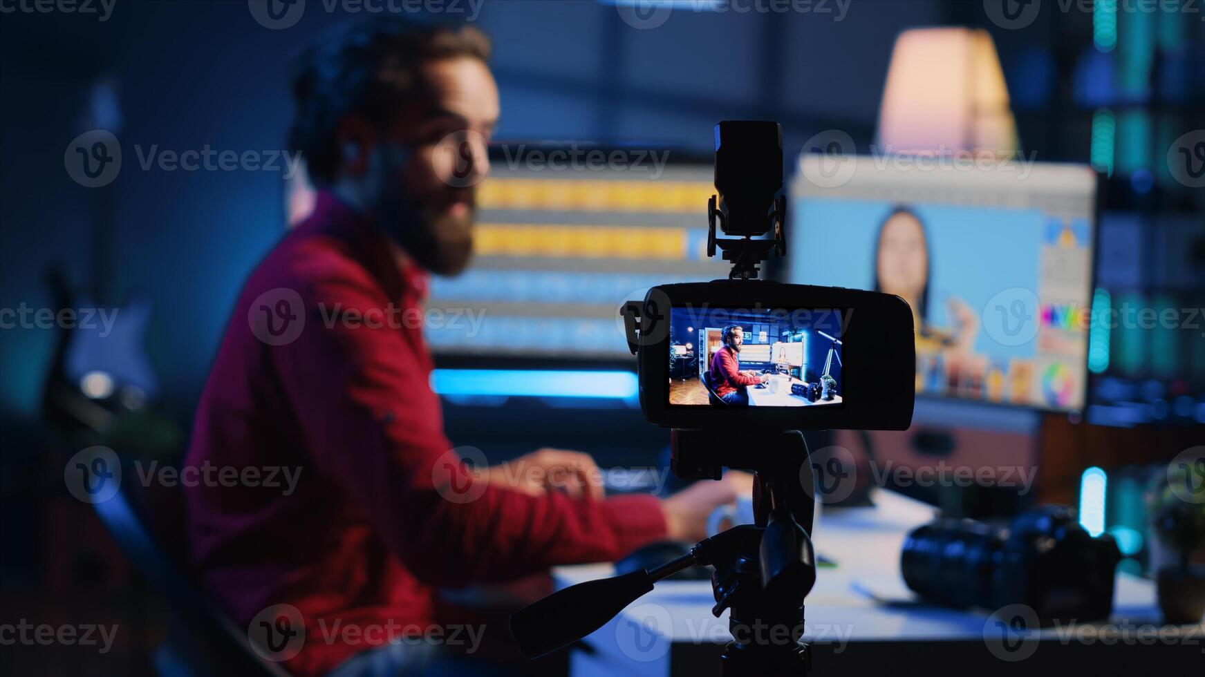 Focus on professional camera used by photographer in blurry background to record basic photography editing techniques guide for beginners. Recording equipment used by freelancer for tutorial, close up photo