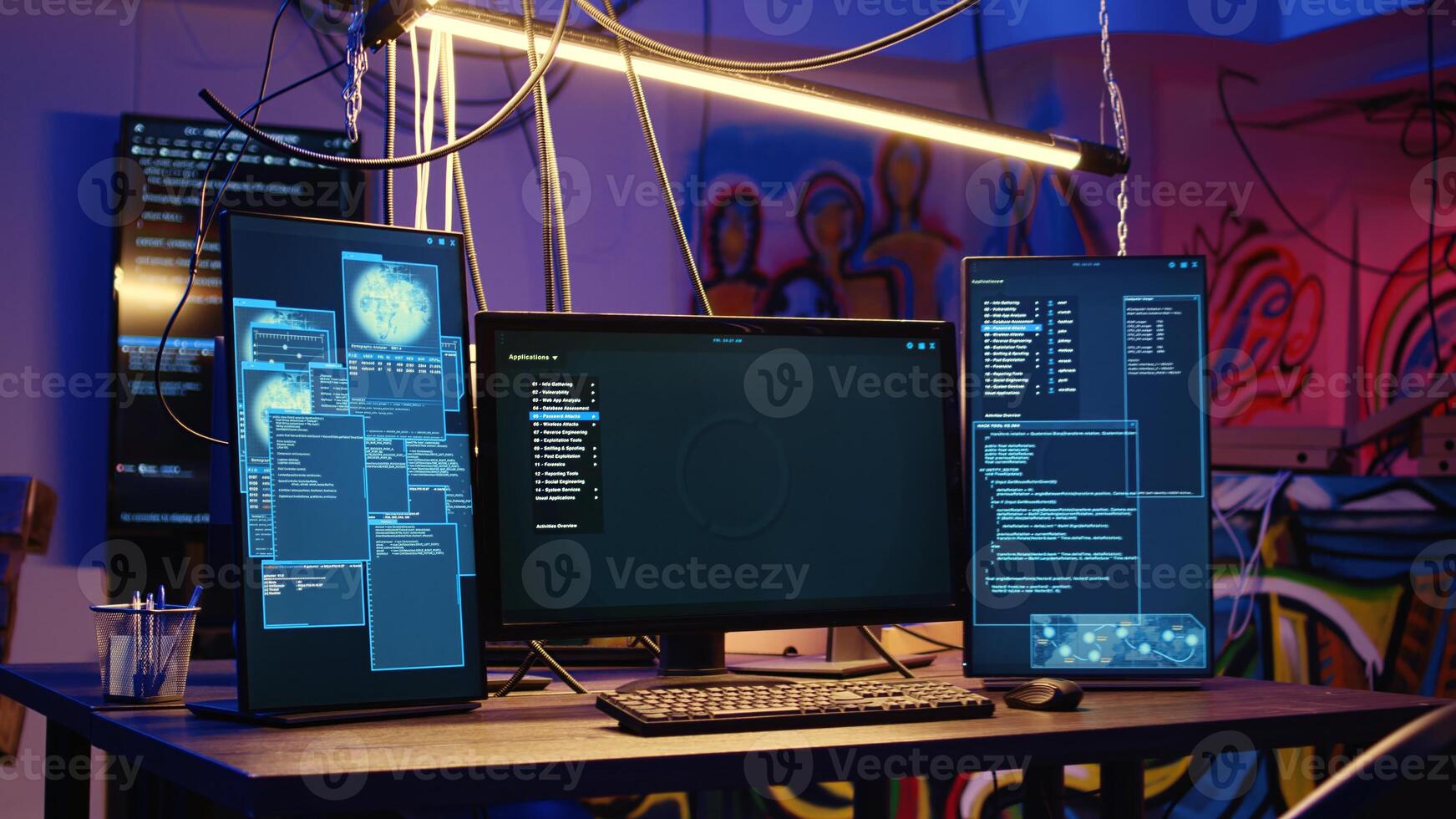 Close up shot of software interface on computer screens showing developer code running in empty criminals den with graffiti sprayed on walls. Hacking malware programming in underground base photo