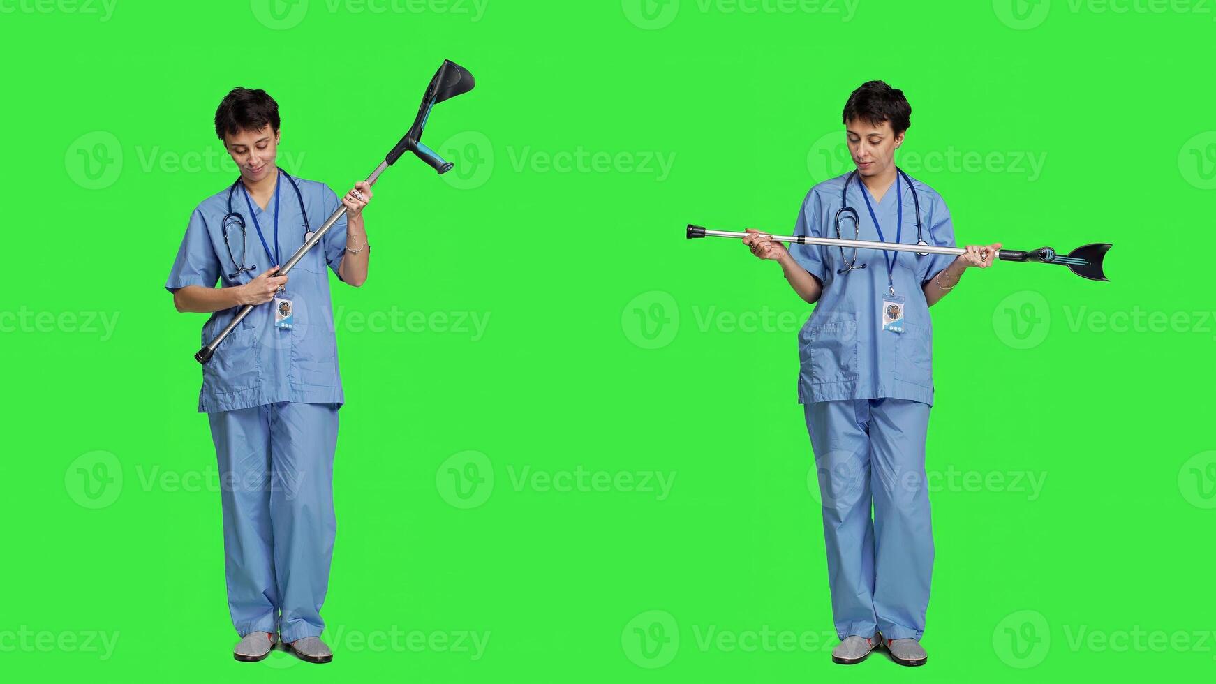 Hospital staff worker assembling crutches to help with mobility and healing, preparing walking tool for someone with broken leg. Medical assistant helping patient with fracture. Camera A. photo