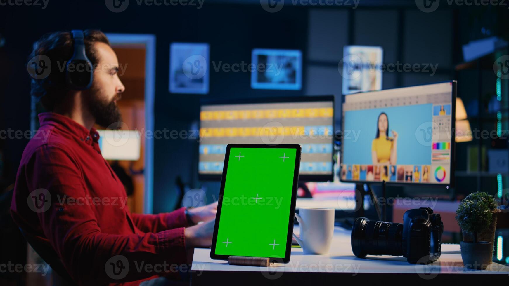 Green screen tablet on desk in graphic design company next to content specialist selecting best editorial pictures for social media. Mockup device near expert editing photos in advertising agency