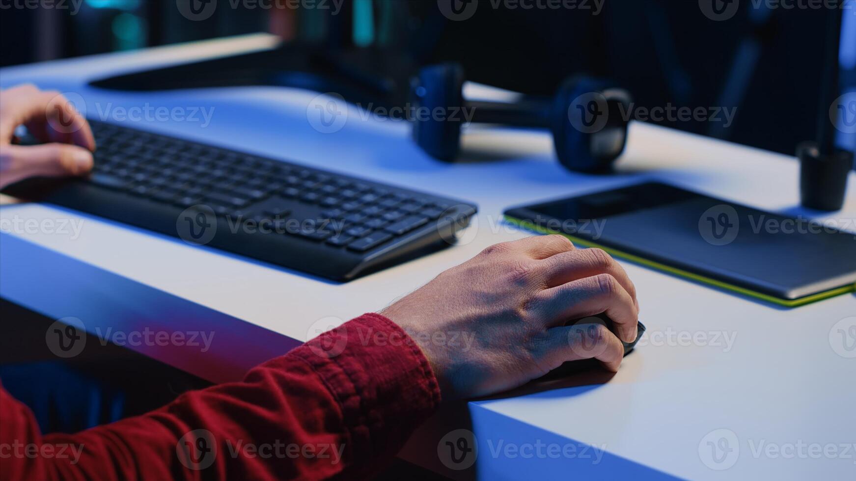 Photographer enhancing images quality, correcting flaws and adjust color, contrast, and brightness in creative studio using mouse, close up. Photo editor editing photographs at office desk