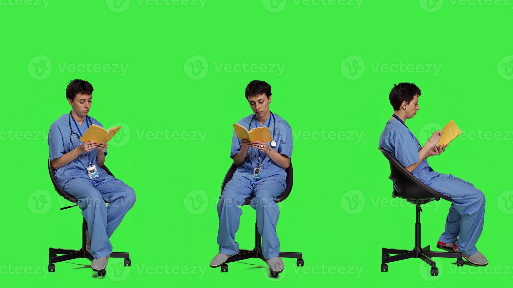 Health specialist is reading a literature book to acquire physician specialization and surgeon expertise, sitting in a chair. Nurse studying healthcare industry lecture against greenscreen. Camera A. photo