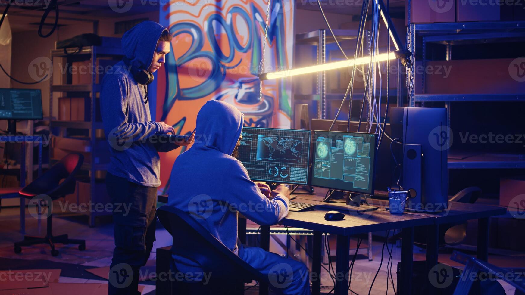 Spies in secret hideout trying to steal valuable data by hacking governmental websites but getting their attacks rejected by strong security, seeing access denied error message on screen photo