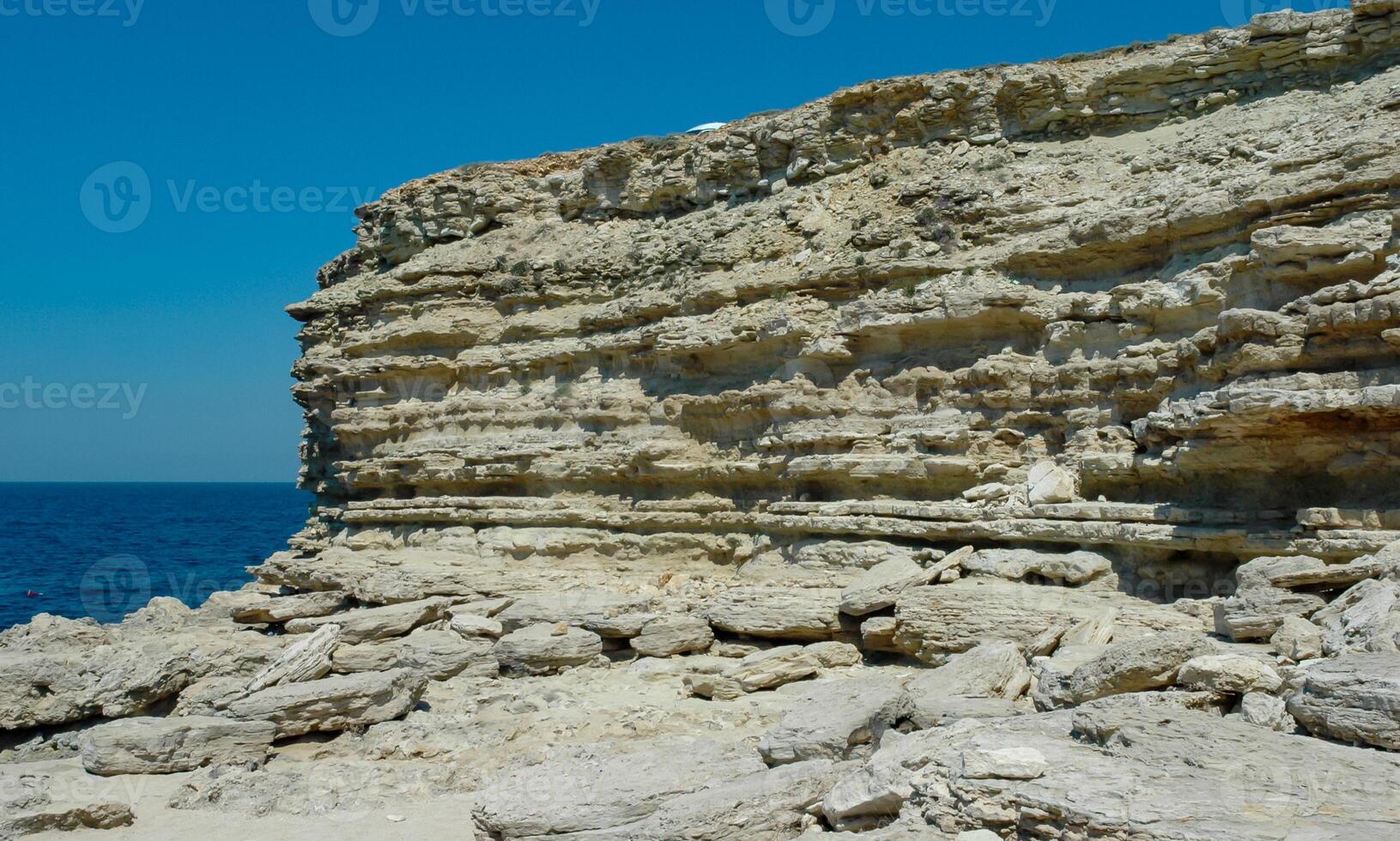 Steep karst limestone shores and rocks in the Dzhangul tract, western Crimea, Tarkhankut photo