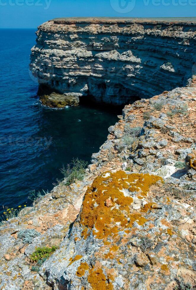 Steep karst limestone shores and rocks in the Dzhangul tract, western Crimea, Tarkhankut photo