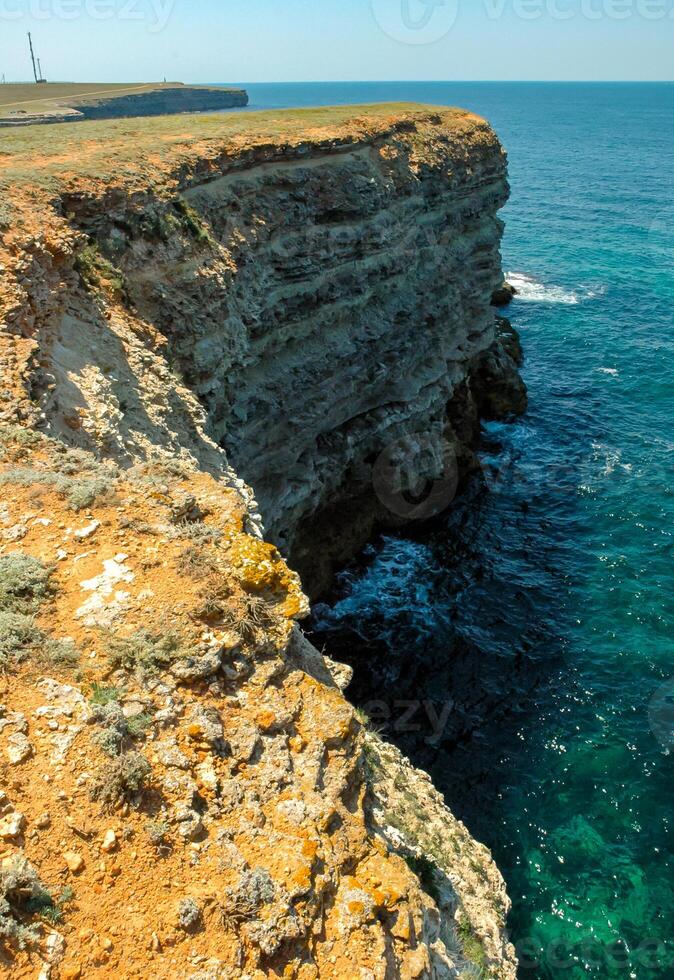 Steep karst limestone shores and rocks in the Dzhangul tract, western Crimea, Tarkhankut photo