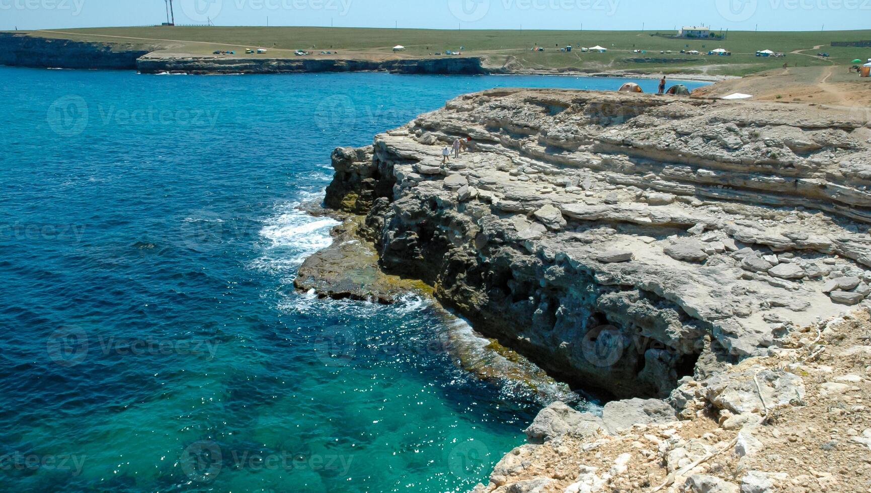 Steep karst limestone shores and rocks in the Dzhangul tract, western Crimea, Tarkhankut photo