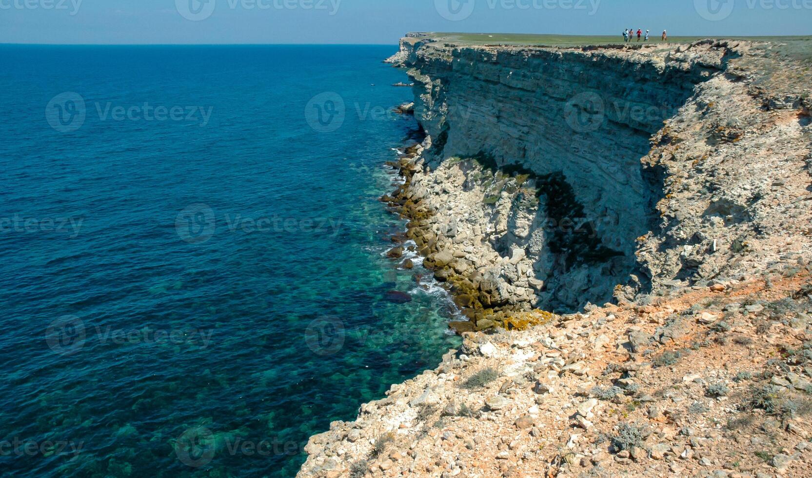 Steep karst limestone shores and rocks in the Dzhangul tract, western Crimea, Tarkhankut photo