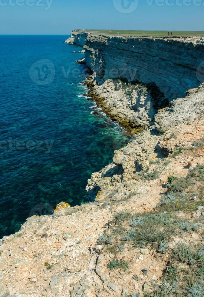 Steep karst limestone shores and rocks in the Dzhangul tract, western Crimea, Tarkhankut photo