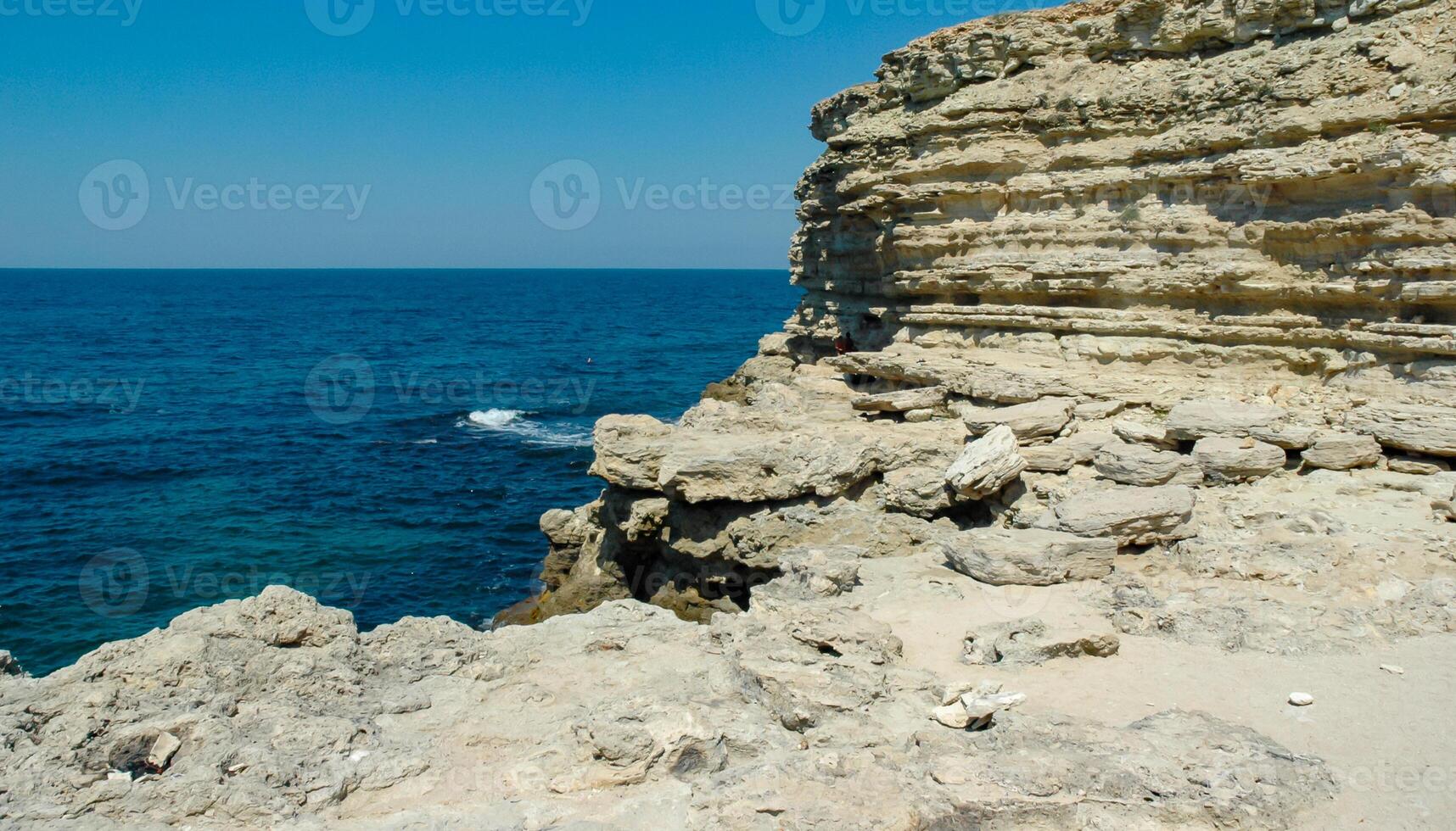 Steep karst limestone shores and rocks in the Dzhangul tract, western Crimea, Tarkhankut photo