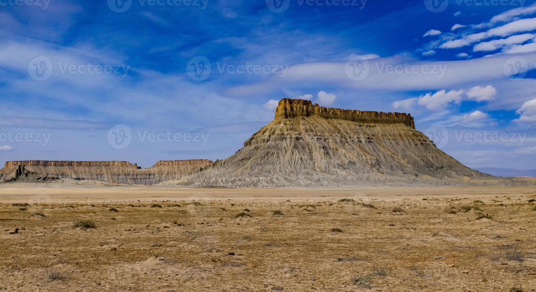 Factory Butte is a summit in Wayne County, Utah, US photo