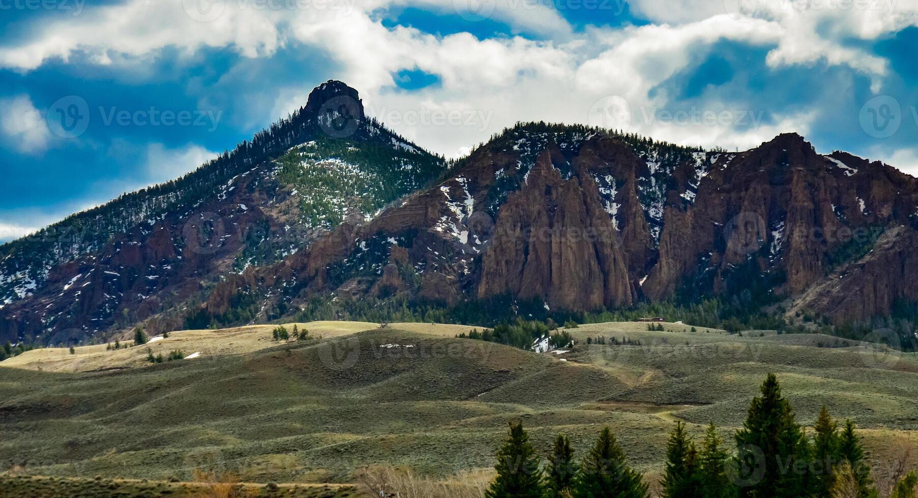 Mountain landscape, snow in the mountains in spring in Montana photo