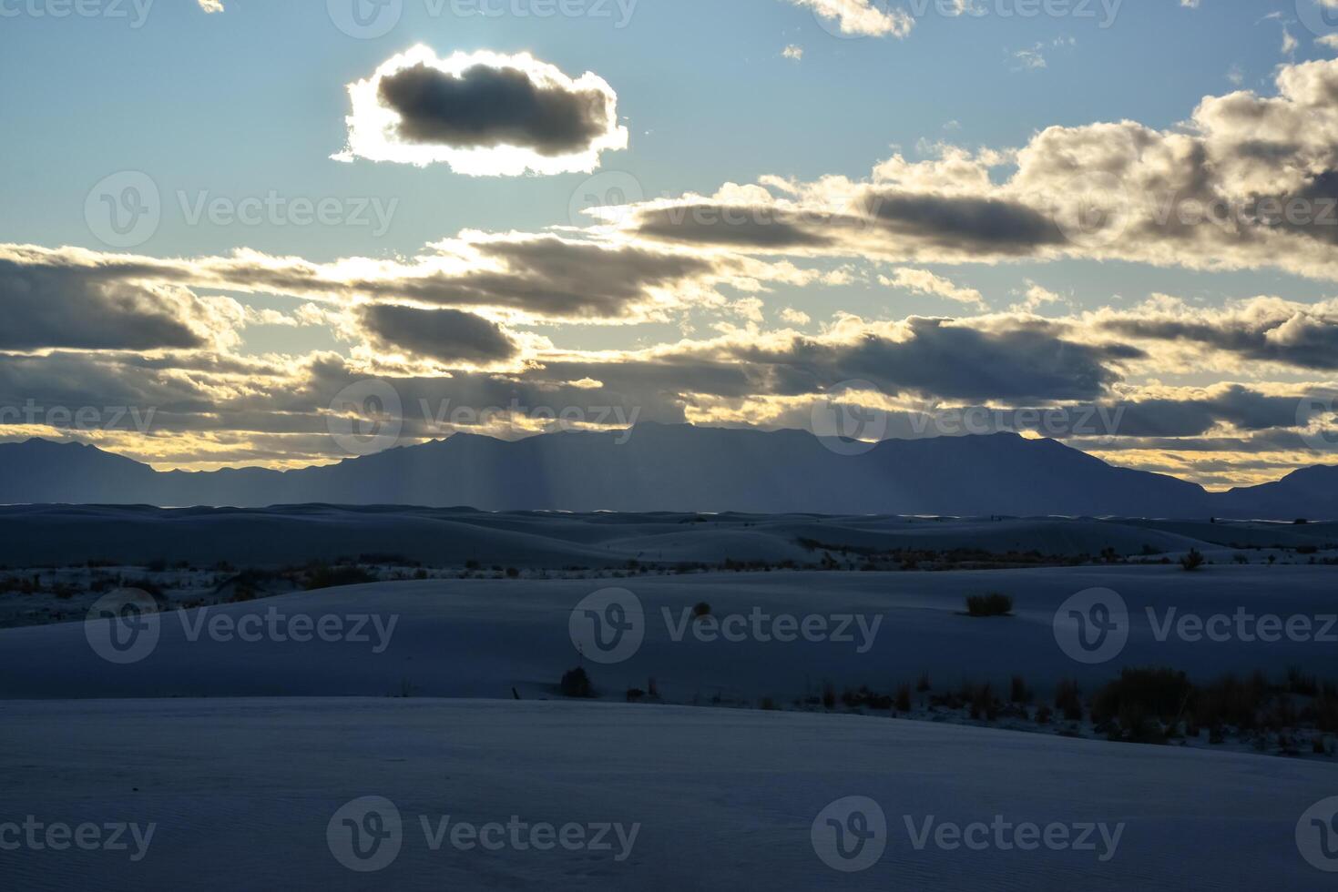 White clouds during sunset over White Sands in New Mexico, USA photo