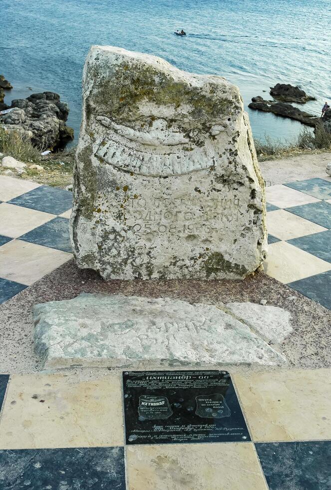 KRIMEA, UKRAINE - AUGUST 10, 2008 a memorial sign on the seashore in honor of the first underwater house in the USSR on Tarkhankut, Crimea photo