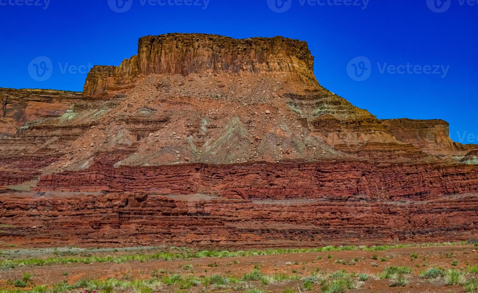 Layered geological formations of red rocks in Canyonlands National Park is in Utah near Moab. photo
