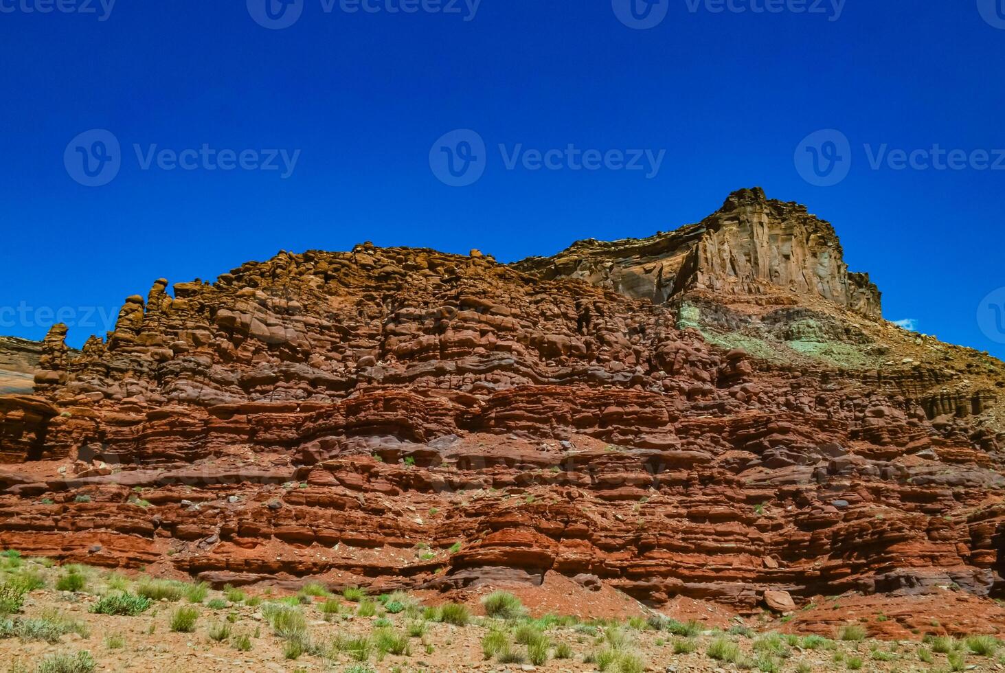 Layered geological formations of red rocks in Canyonlands National Park is in Utah near Moab. photo