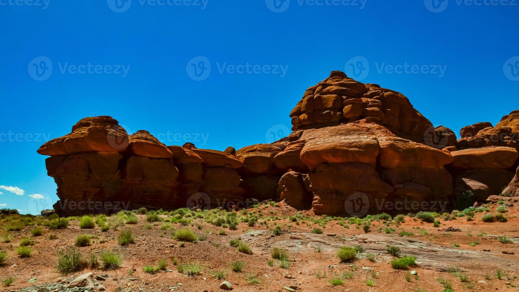 Layered geological formations of red rocks in Canyonlands National Park is in Utah near Moab. photo
