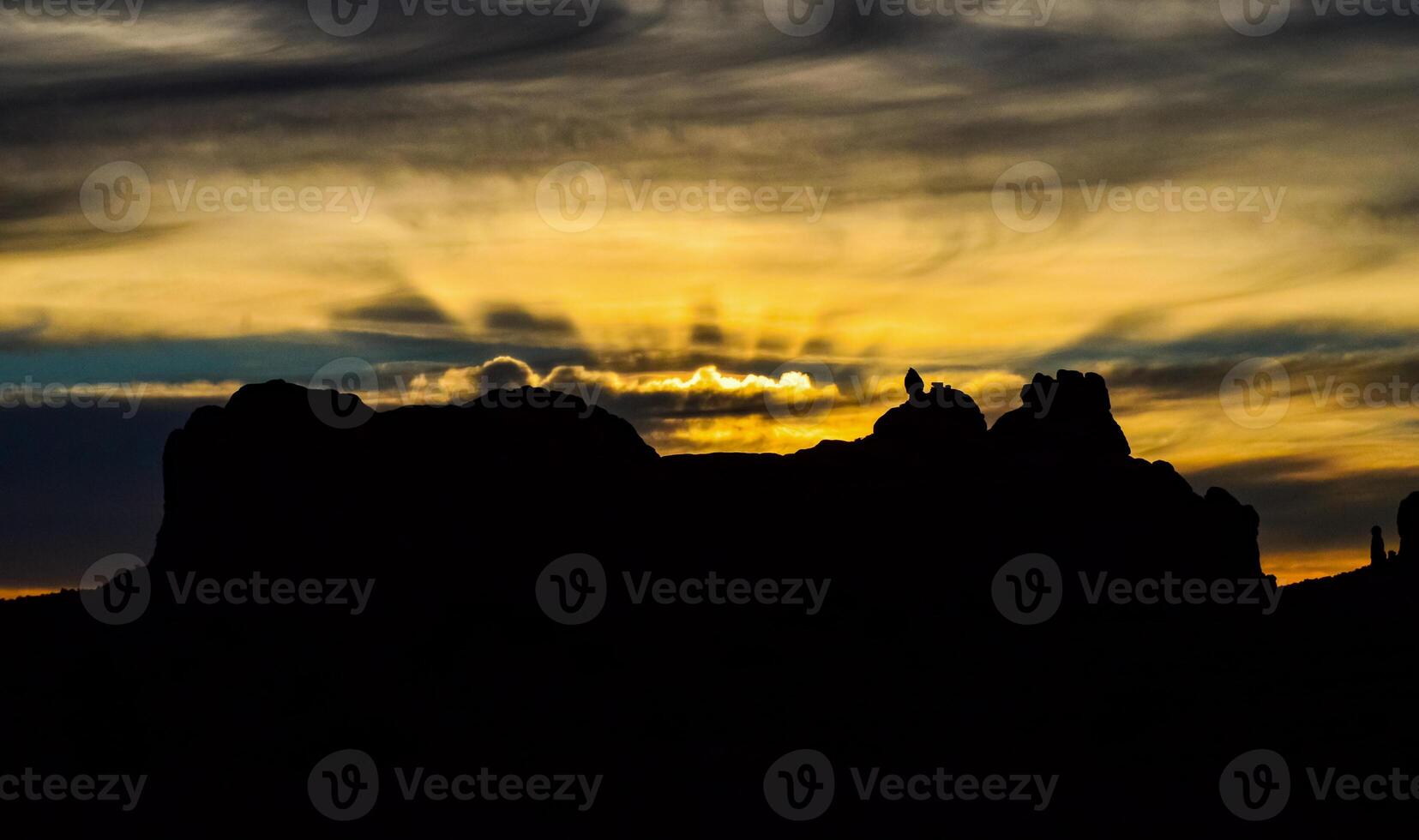 Evening sunset against the backdrop of the mountain landscape, and the red mountains. Canyonlands, Moab, Utah photo