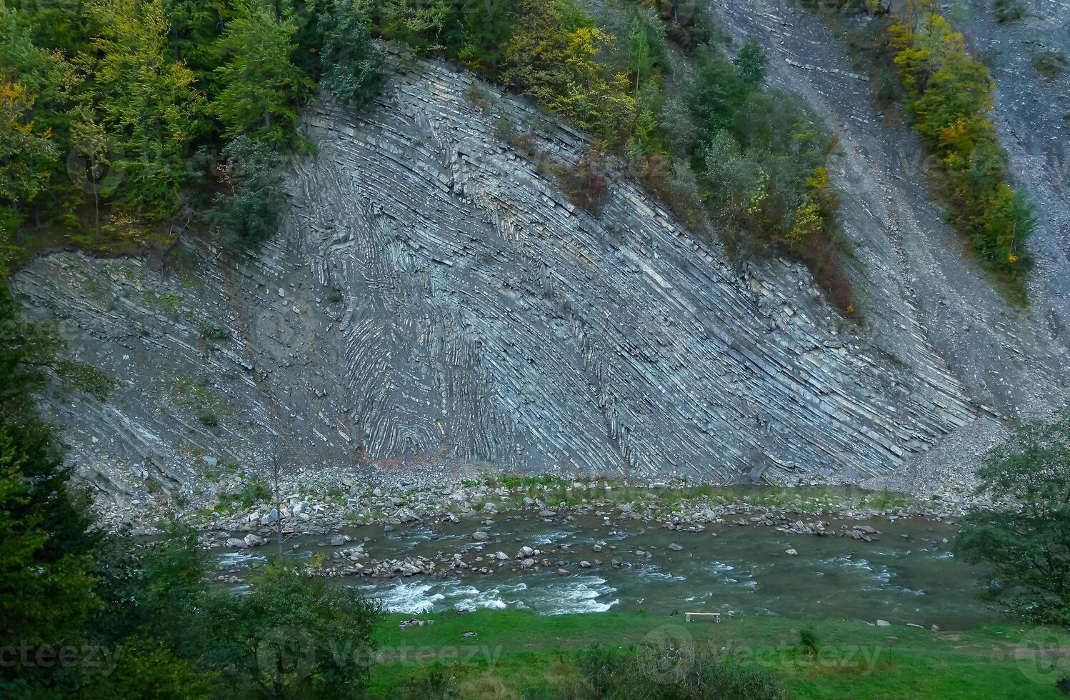 Geology of the mountains of Ukraine, Layered sloping rocks in the Ivano-Frankivsk region, Ukraine photo