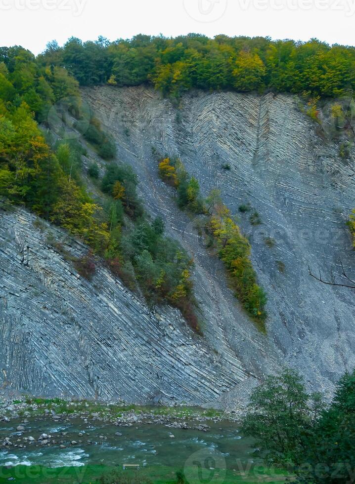 Geology of the mountains of Ukraine, Layered sloping rocks in the Ivano-Frankivsk region, Ukraine photo