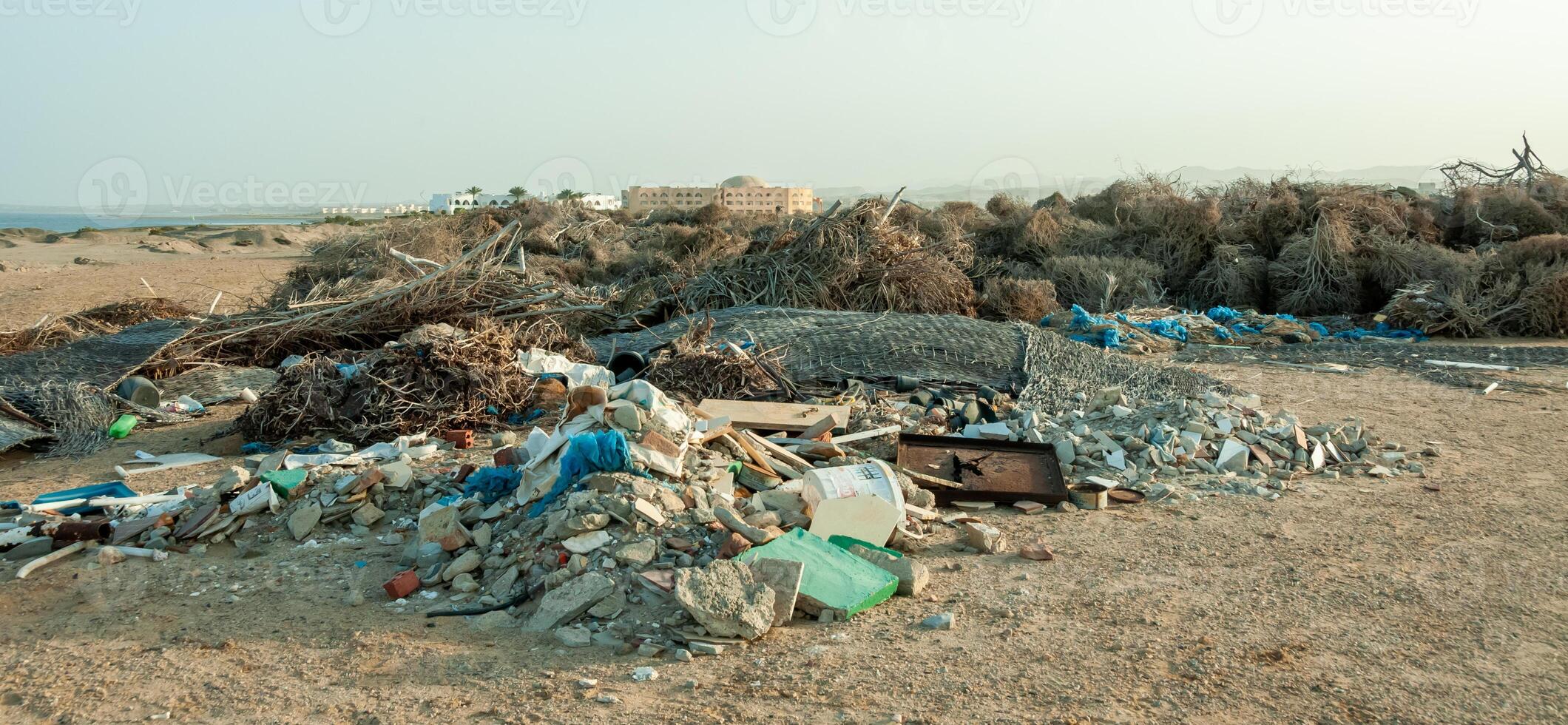 Plastic bottles and various garbage from hotels in the wild, Garbage dump in the desert in Egypt photo