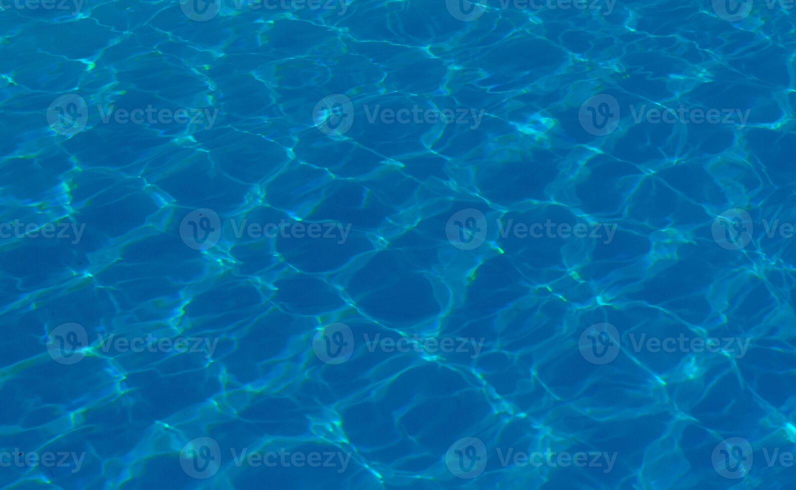 The reflection of the suns rays in the water in the pool with sea water, The glare of the sun, Egypt photo