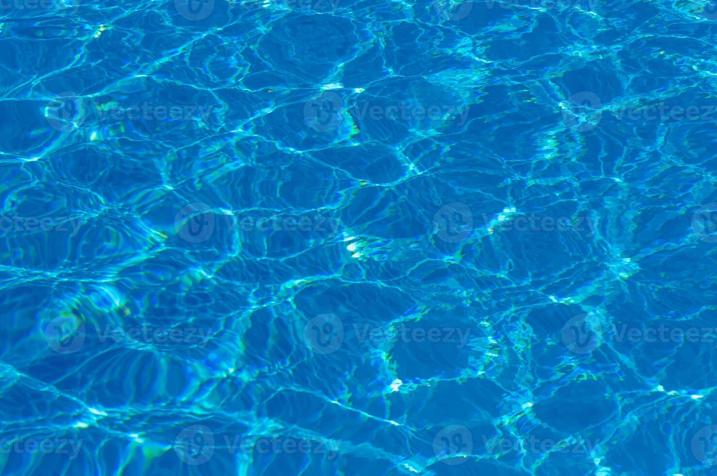 The reflection of the suns rays in the water in the pool with sea water, The glare of the sun, Egypt photo