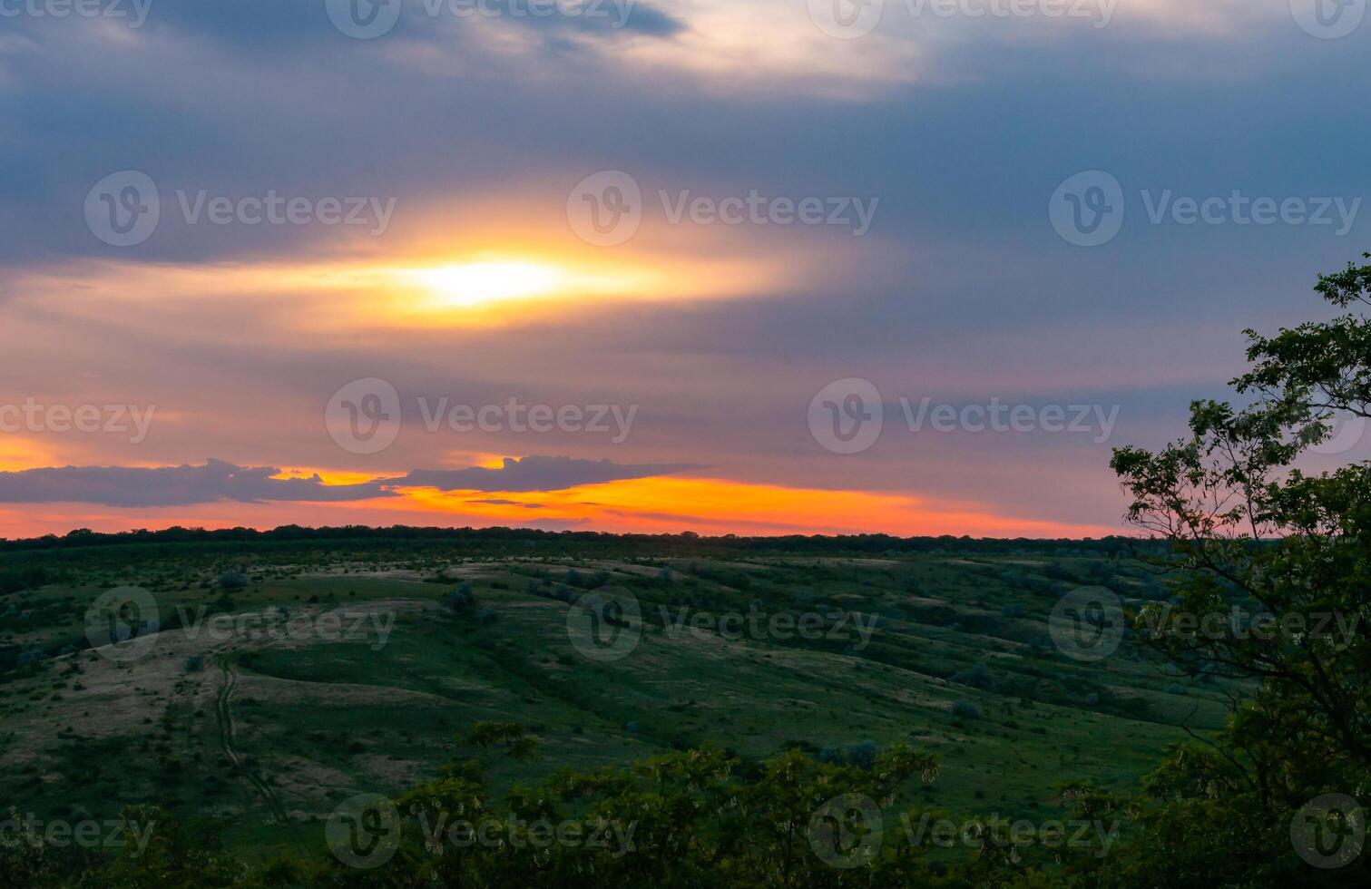 Orange sunset with clouds over the shore Tiligul Estuary, Ukraine photo