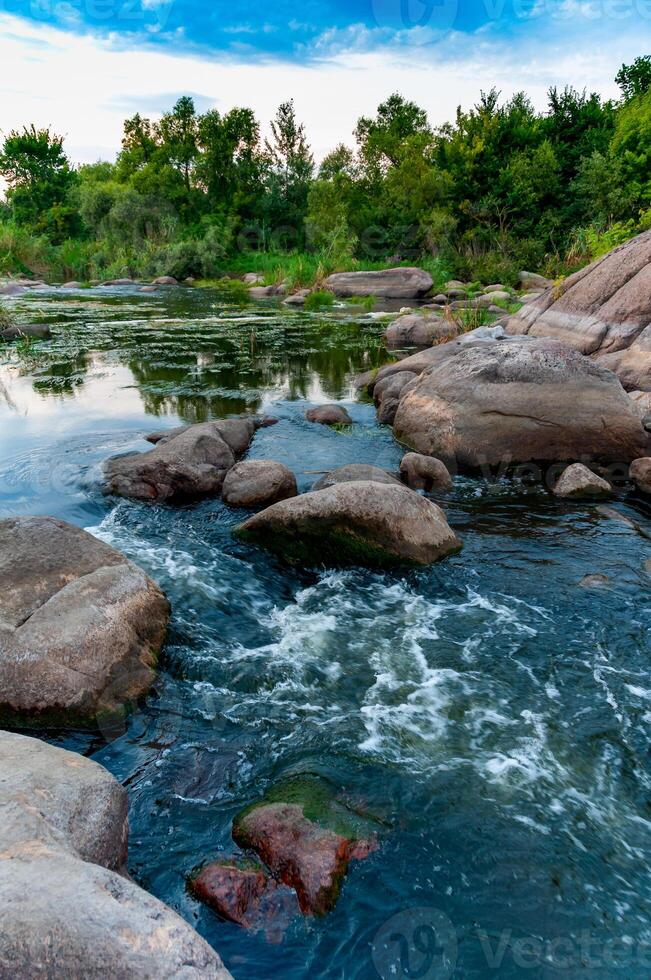 Granite rapids and rapids with rapidly flowing water on the South Bug River photo