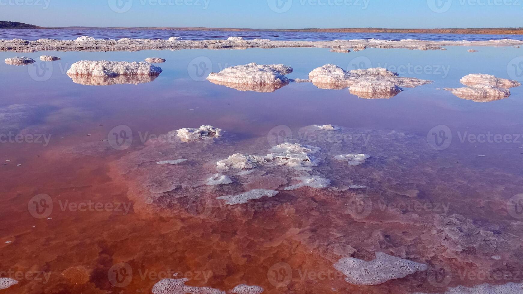 Kuyalnik estuary, Black Sea. Self-precipitating salt at the bottom and bank of the estuary. Table salt crystals photo