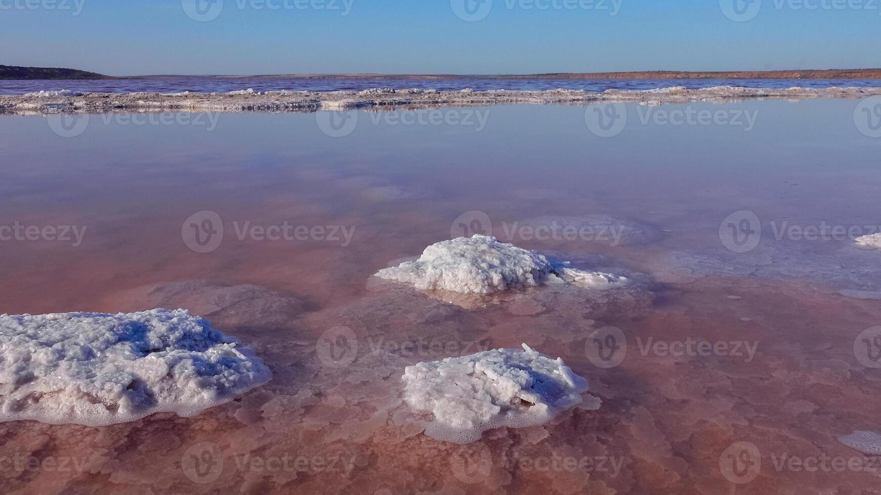 Kuyalnik estuary, Black Sea. Self-precipitating salt at the bottom and bank of the estuary. Table salt crystals photo