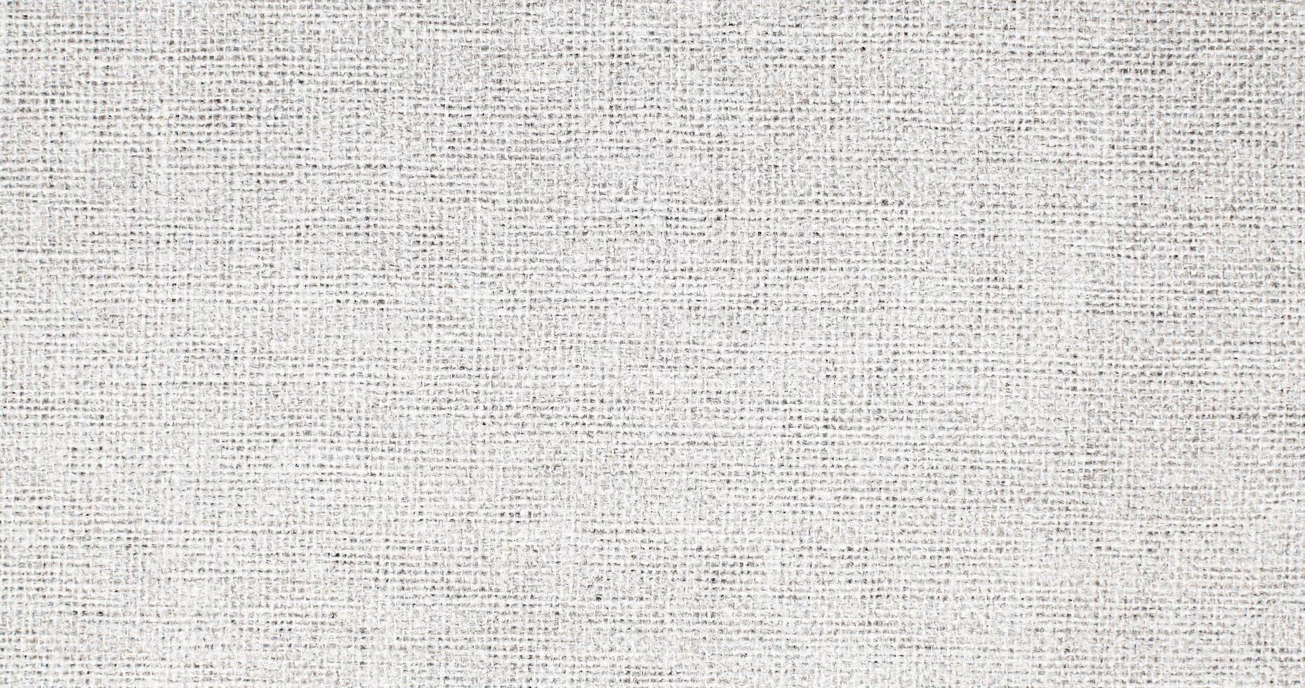 Natural Linen Material Textile Canvas Fabric Texture Background Close-up Detail of Fabric Natural Color Hemp Material Pattern Design Wallpaper. Can be Used as Background or For Graphic Design photo