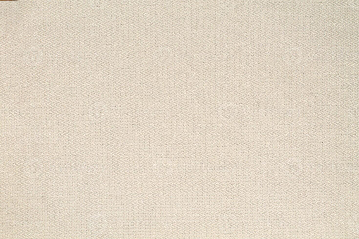 Natural Linen Material Textile Canvas Fabric Texture Background Close-up Detail of Fabric Natural Color Hemp Material Pattern Design Wallpaper. Can be Used as Background or For Graphic Design photo