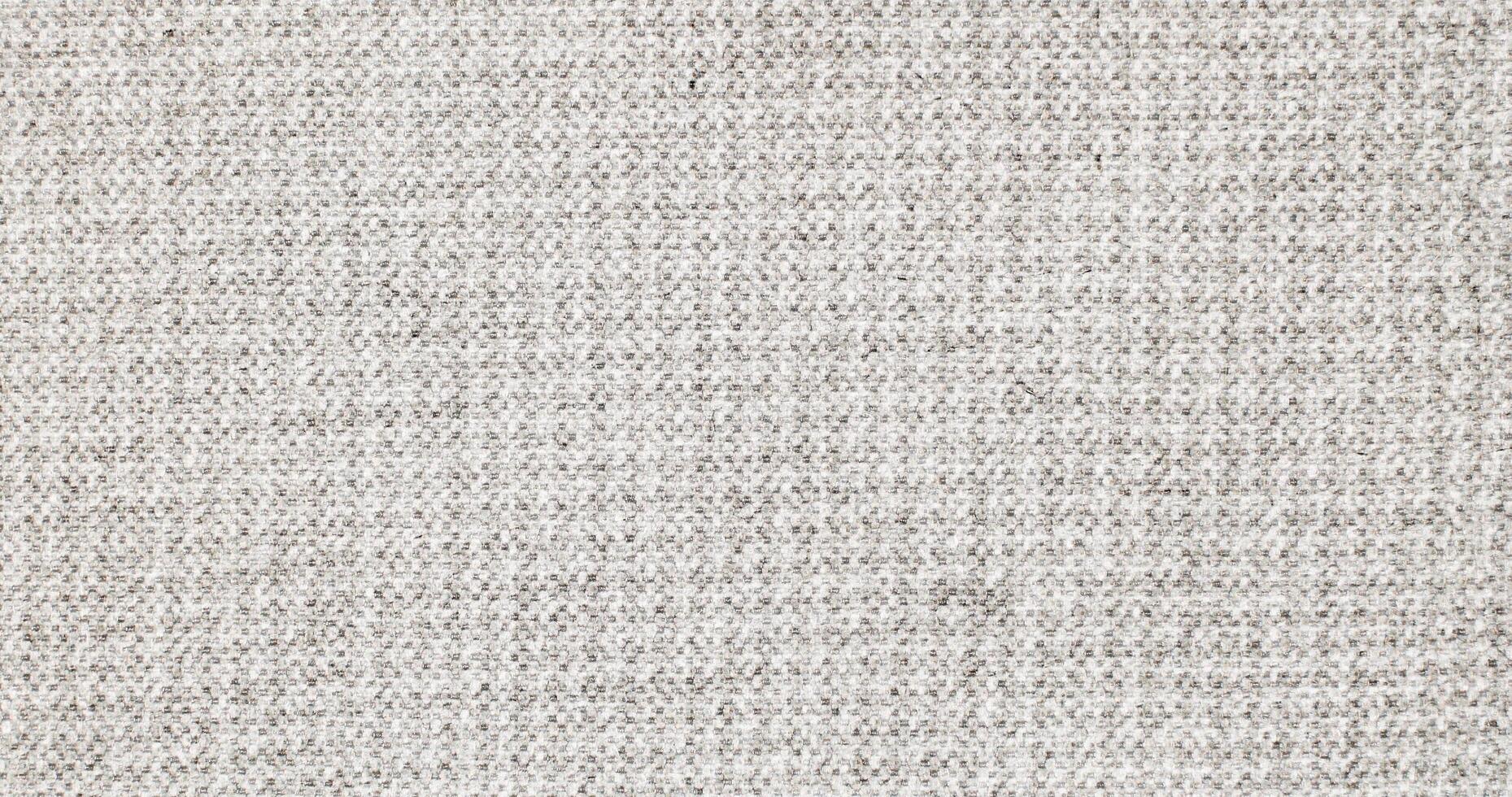 Natural Linen Material Textile Canvas Fabric Texture Background Close-up Detail of Fabric Natural Color Hemp Material Pattern Design Wallpaper. Can be Used as Background or For Graphic Design photo